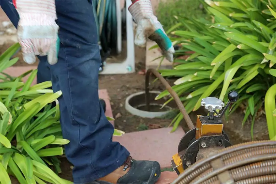 Plumber performing plumbing work